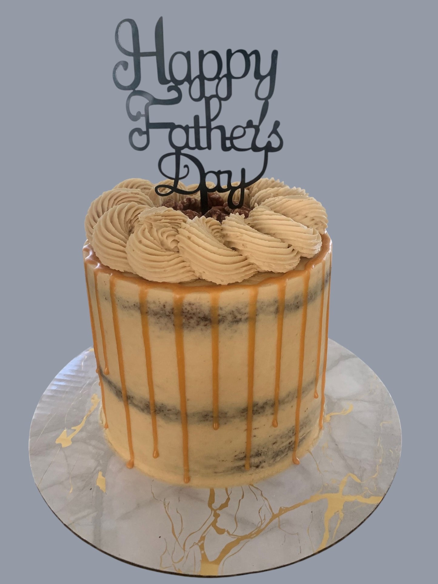 Sarah's Cakes Father's Day drip cake with caramel glaze and buttercream frosting.